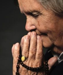 6701-old woman praying.220w.tn