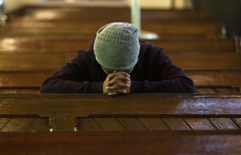 praying-in-church-in-india